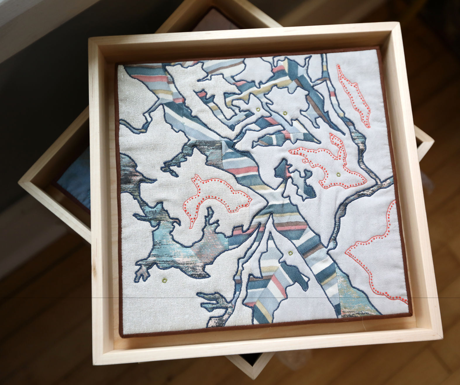 Map textile art by Leah Evans